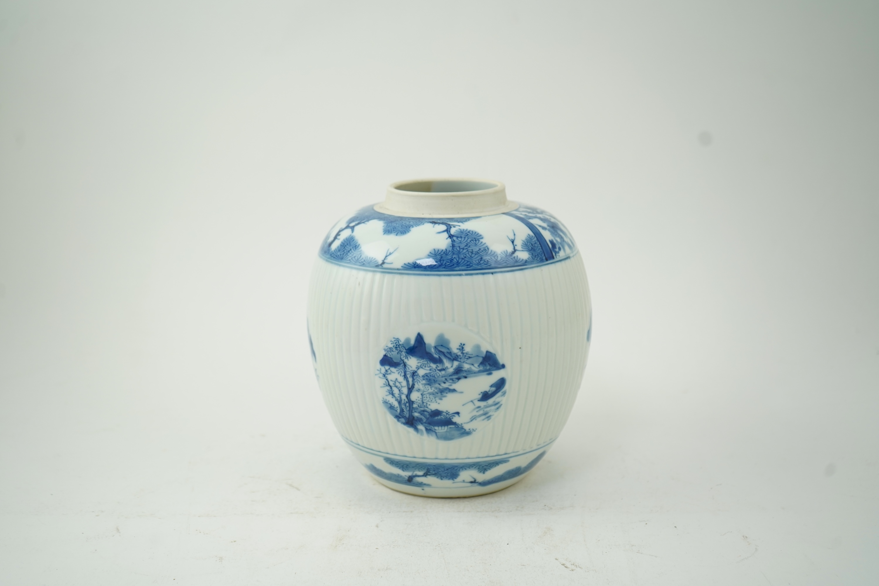 A Chinese blue and white ribbed ovoid jar, in Kangxi style, late 19th/early 20th century